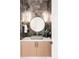 Chic powder room with stylish vanity, modern fixtures, and dark tiled walls, creating an elegant space at 1466 S Gaylord St, Denver, CO 80210