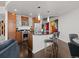 Spacious kitchen featuring modern appliances, granite countertops, and stylish breakfast bar at 891 14Th St # 3411, Denver, CO 80202