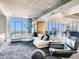 Bright and open living space with floor-to-ceiling windows and stylish contemporary decor at 891 14Th St # 3411, Denver, CO 80202