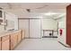 Basement kitchenette with sink, cabinets, and appliances at 912 S Kingston St, Aurora, CO 80012