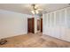 View of bedroom showcasing closet and multiple entry doors at 912 S Kingston St, Aurora, CO 80012