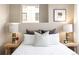 Well-lit bedroom features neutral tones and stylish decor at 1975 N Grant St # 617, Denver, CO 80203