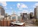 Stunning city views showcase Denver's skyline from this property, including high-rise buildings and a construction site at 1975 N Grant St # 617, Denver, CO 80203