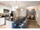 Kitchen includes black countertops, breakfast bar with seating, and stainless steel appliances at 1975 N Grant St # 617, Denver, CO 80203