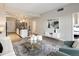 Spacious open floorplan with living and dining areas with hardwood floors and modern appliances at 1975 N Grant St # 617, Denver, CO 80203