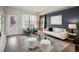 Modern living room with plush seating, stylish decor, and lots of natural light at 1975 N Grant St # 617, Denver, CO 80203