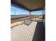 Back deck is covered and overlooks the backyard at 2184 S Gold Bug Ct, Aurora, CO 80018