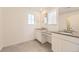 Bathroom featuring double vanity sinks, gray countertops and tile flooring at 2184 S Gold Bug Ct, Aurora, CO 80018