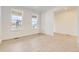 Bright bedroom with two windows, neutral carpet, and ample natural light at 2184 S Gold Bug Ct, Aurora, CO 80018