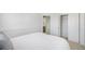 Comfortable bedroom featuring a closet and a view to the bathroom at 5405 Military Trl, Parker, CO 80134