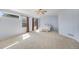 Large main bedroom with ample natural light and neutral carpet at 5405 Military Trl, Parker, CO 80134