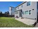 Well-maintained backyard with a concrete patio, perfect for outdoor relaxation and grilling with friends and Gathering at 1173 Basalt Ridge Loop, Castle Rock, CO 80108