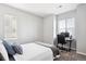 Bedroom with two windows and a desk, perfect for study and rest at 1173 Basalt Ridge Loop, Castle Rock, CO 80108