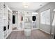 Spacious walk-in closet with custom shelving, drawers, and plenty of room for organization at 1173 Basalt Ridge Loop, Castle Rock, CO 80108