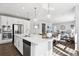 Bright, open kitchen boasts a large island, stainless appliances, and seamless flow into the adjacent living area at 1173 Basalt Ridge Loop, Castle Rock, CO 80108