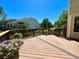 Enjoy outdoor living on this well-maintained deck, surrounded by lush landscaping at 8114 Briar Ridge Dr, Castle Pines, CO 80108