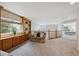 Comfortable upstairs loft area with built-in shelves and plenty of natural light at 8114 Briar Ridge Dr, Castle Pines, CO 80108