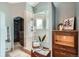 Bright bathroom with a glass-enclosed shower, vanity with drawers, and a walk-in closet at 5784 W 81St Cir, Arvada, CO 80003