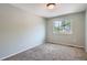 Bedroom with carpet and a window at 5784 W 81St Cir, Arvada, CO 80003