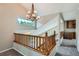 Staircase with a chandelier at 5784 W 81St Cir, Arvada, CO 80003