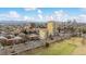 A scenic aerial view showcases city skyline views, highlighting nearby parks and tree-lined streets at 33 N Corona St # 401, Denver, CO 80218