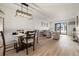This dining area features modern table and decor, offering an ideal space for dining and entertaining at 7770 W 38Th Ave # 108, Wheat Ridge, CO 80033