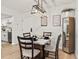 Modern dining room with stylish table and decor creating an inviting space for meals and gatherings at 7770 W 38Th Ave # 108, Wheat Ridge, CO 80033