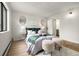 The main bedroom features cozy furnishings, soft lighting, and stylish accents creating a relaxing retreat at 7770 W 38Th Ave # 108, Wheat Ridge, CO 80033