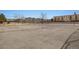 Well-maintained community tennis court with view of apartment buildings in the background at 7770 W 38Th Ave # 108, Wheat Ridge, CO 80033