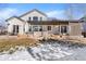 Spacious backyard with pergola, patio, and firepit at 806 Ridgemont Cir, Highlands Ranch, CO 80126