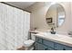 Simple bathroom with shower/tub combo and updated vanity at 806 Ridgemont Cir, Highlands Ranch, CO 80126