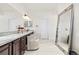 Elegant bathroom with double vanity, large mirror, and plenty of counter space at 806 Ridgemont Cir, Highlands Ranch, CO 80126