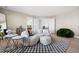 Cozy Gathering room featuring a comfortable sofa and stylish decor at 806 Ridgemont Cir, Highlands Ranch, CO 80126