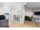 Bright hallway with a view into a media room and wet bar at 806 Ridgemont Cir, Highlands Ranch, CO 80126