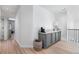 Bright hallway with built-in cabinetry and wood flooring at 806 Ridgemont Cir, Highlands Ranch, CO 80126