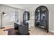 Home office with a modern desk and built-in shelving at 806 Ridgemont Cir, Highlands Ranch, CO 80126