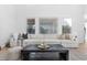 Spacious living room featuring a large sectional sofa and a coffee table at 806 Ridgemont Cir, Highlands Ranch, CO 80126