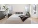 Main bedroom with a plush bed and ample natural light at 806 Ridgemont Cir, Highlands Ranch, CO 80126