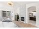 Spacious main bedroom with fireplace and ensuite bathroom at 806 Ridgemont Cir, Highlands Ranch, CO 80126