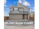 Beautiful two-story home with a two-car garage and modern architectural details at 10011 Yampa Ct, Commerce City, CO 80022