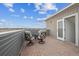 Enjoy the view from this rooftop patio with brick pavers and open doorway at 10011 Yampa Ct, Commerce City, CO 80022