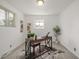 Charming office space features wood desk, unique rug, and bright natural light at 7828 Florado St, Denver, CO 80221