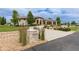 Beautiful stone home featuring a private driveway and three-car garage, all on a sprawling lawn at 5767 Pelican Shores Dr, Longmont, CO 80504