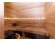 Beautiful home sauna with wooden benches and heater, perfect for relaxation at 5767 Pelican Shores Dr, Longmont, CO 80504