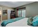 Cozy bedroom features a charming window seat and serene decor at 7840 S Windermere Cir, Littleton, CO 80120