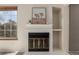 Close up of a fireplace and the windows on the side at 13792 E Lehigh Ave # E, Aurora, CO 80014