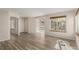 Open living space with new flooring and access to other rooms at 13792 E Lehigh Ave # E, Aurora, CO 80014