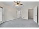Comfortable bedroom with ceiling fan and multiple closets at 1050 Opal St # 102, Broomfield, CO 80020