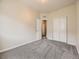 Bedroom featuring a closet, and neutral walls at 600 E Dry Creek Pl, Littleton, CO 80122