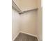 Walk-in closet with carpet flooring and metal shelving at 600 E Dry Creek Pl, Littleton, CO 80122